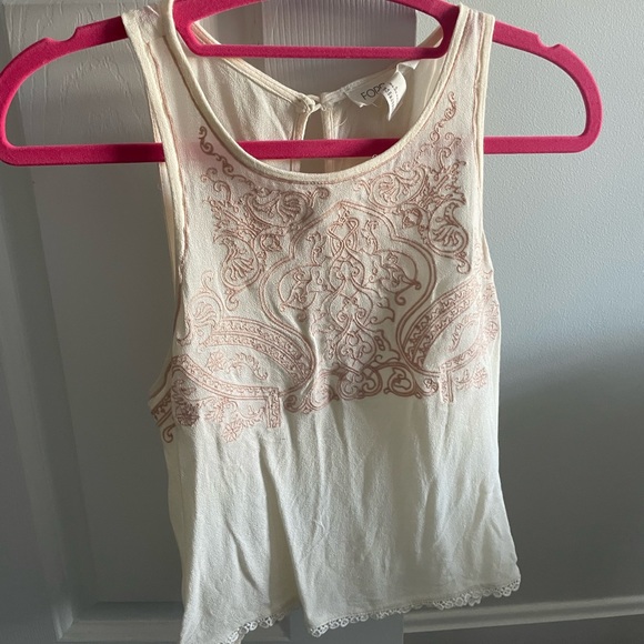 White tank top with pink details and lace trim on the bottom - Picture 1 of 3